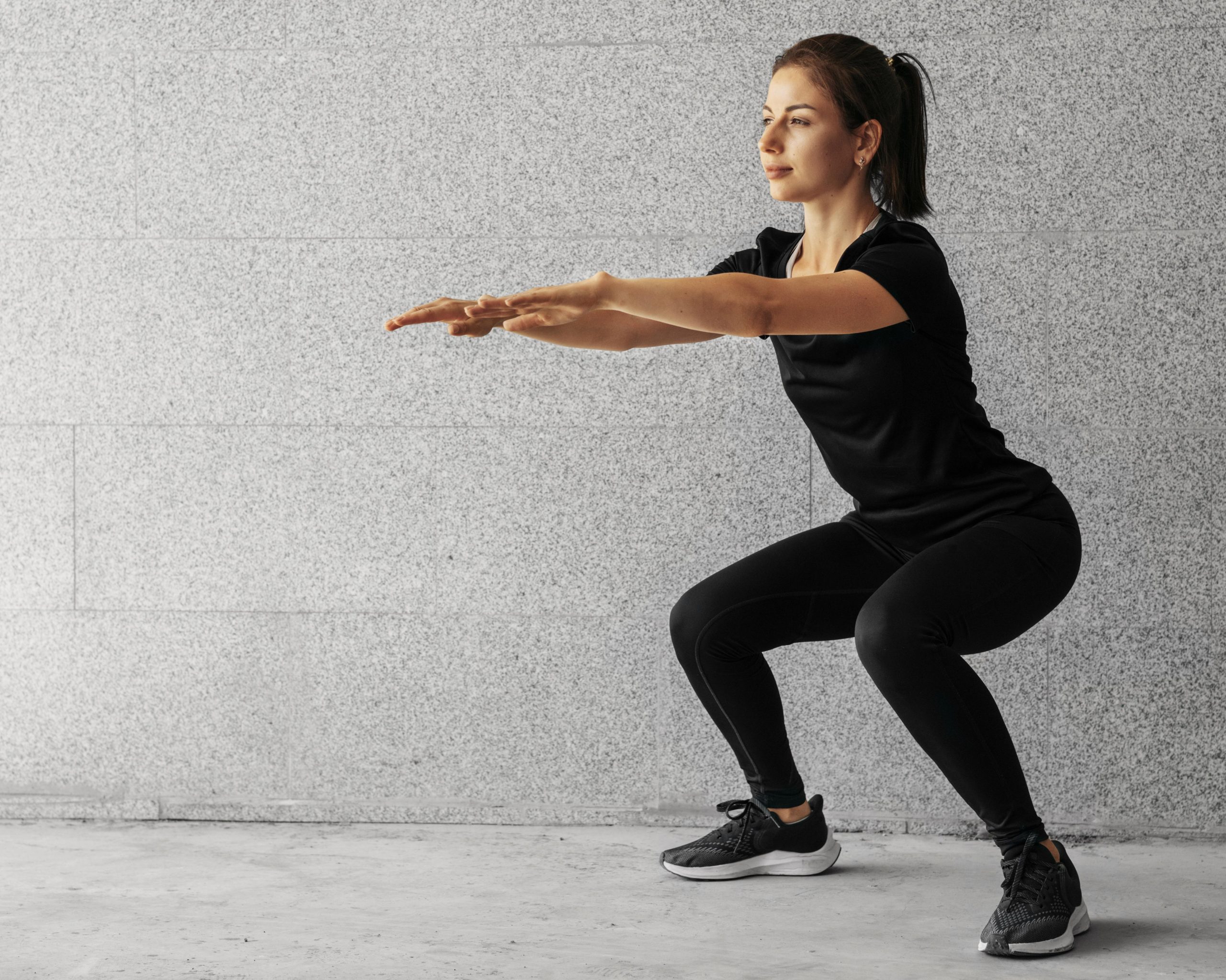 full-shot-woman-doing-squats